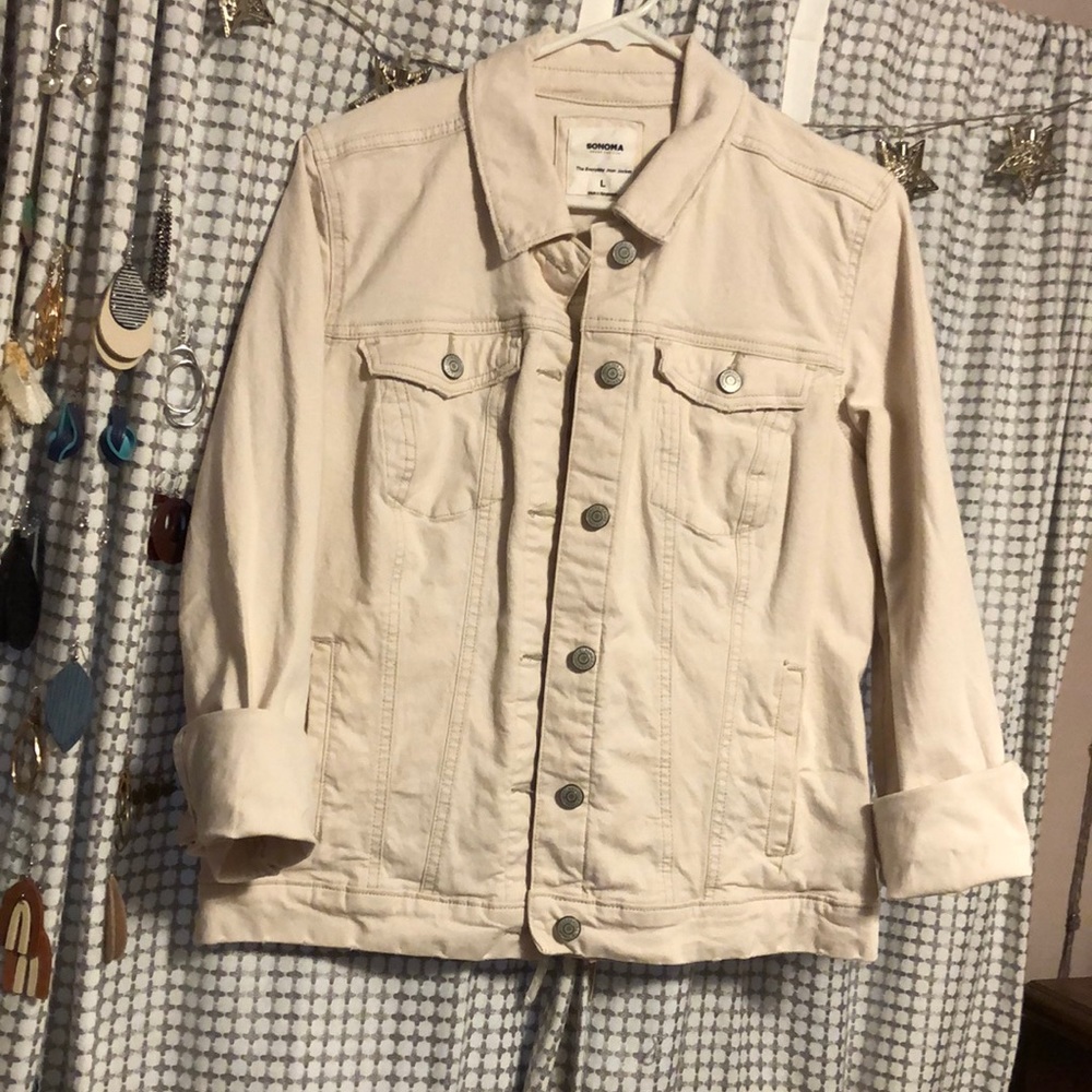 Denim jacket, natural or ecru color. Goes w everything!